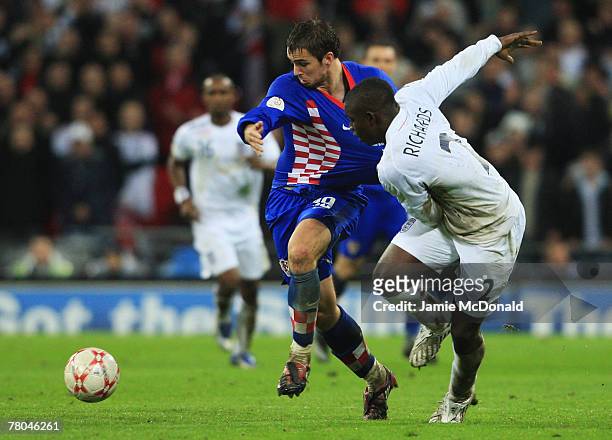 Micah Richards of England challenges Niko Kranjcar of Croatia during the Euro 2008 Group E qualifying match between England and Croatia at Wembley...