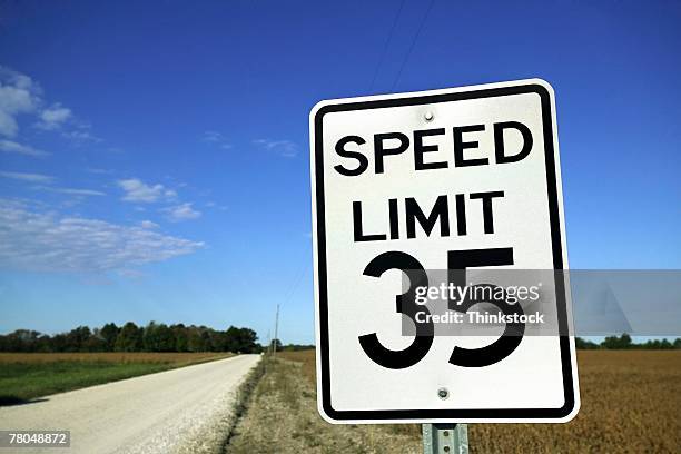 speed limit sign in rural setting - speed limit sign stock pictures, royalty-free photos & images