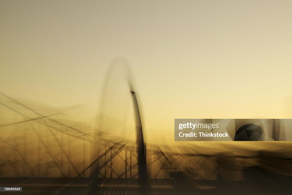 Blurry view of Gateway Arch at sunset