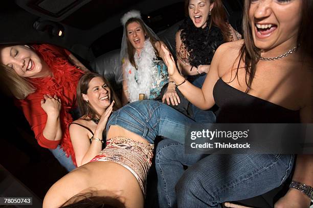 women at bachelorette party - spanking woman stock pictures, royalty-free photos & images