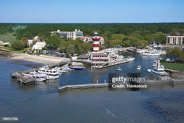 aerial view of hilton head lighthouse and marina, south carolina - hilton head photos et images de collection