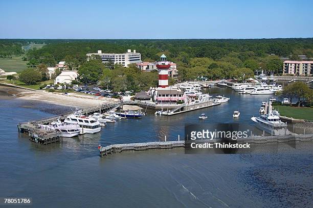 aerial view of hilton head lighthouse and marina, south carolina - hilton head stock pictures, royalty-free photos & images