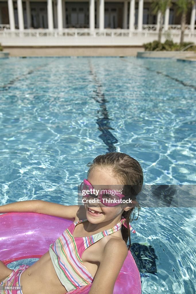 Tween Floating Inpool Girl Floating In Swimming Pool High-Res Stock Photo - Getty Images