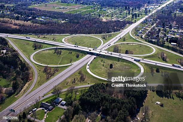 aerial view of cloverleaf freeway intersection in south bend, indiana - indiana stock pictures, royalty-free photos & images