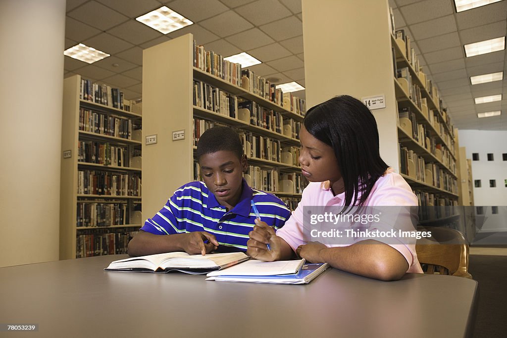 Library Do Homework Teenagers Doing Homework In Library High-Res Stock Photo - Getty Images
