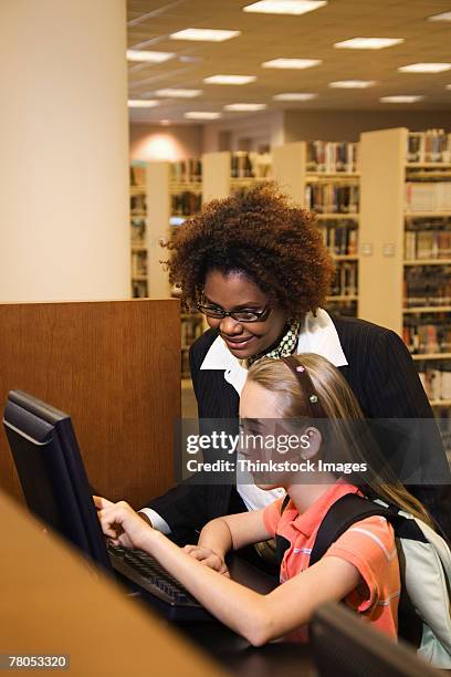 Librarian Using Computer Librarian Technology Photos and Premium High Res Pictures - Getty Images