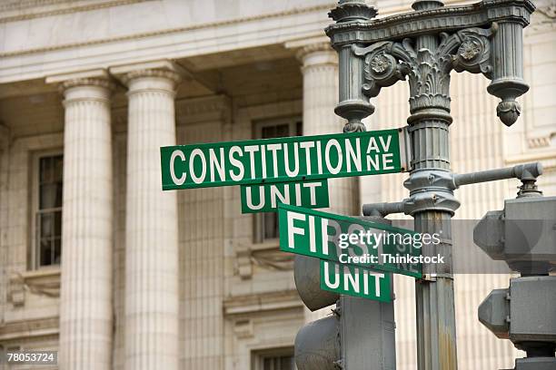 street signs near united states capitol building, washington, dc - constitution avenue stock pictures, royalty-free photos & images