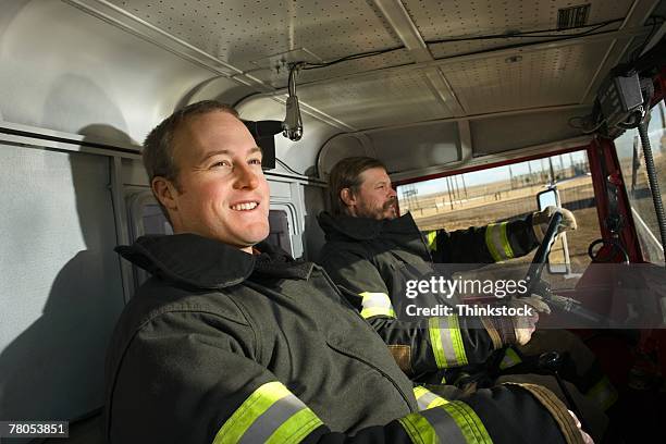 354 Firefighter Driving Truck Stock Photos, High-Res Pictures, and ...