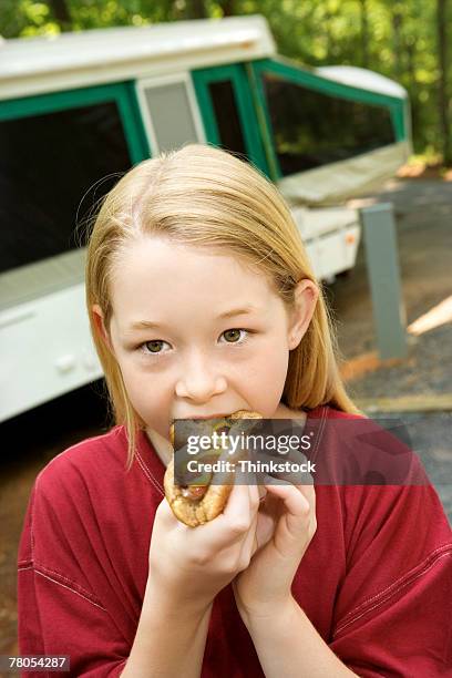 girl eating hot dog - dog eating a girl out stock pictures, royalty-free photos & images