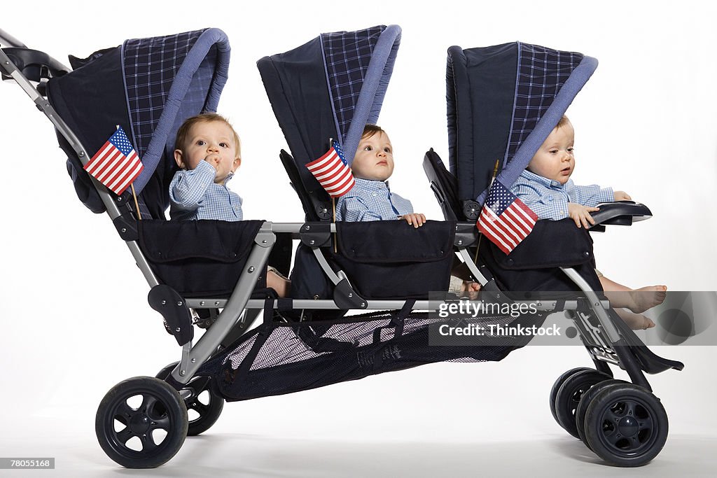 Babies with American flags in stroller