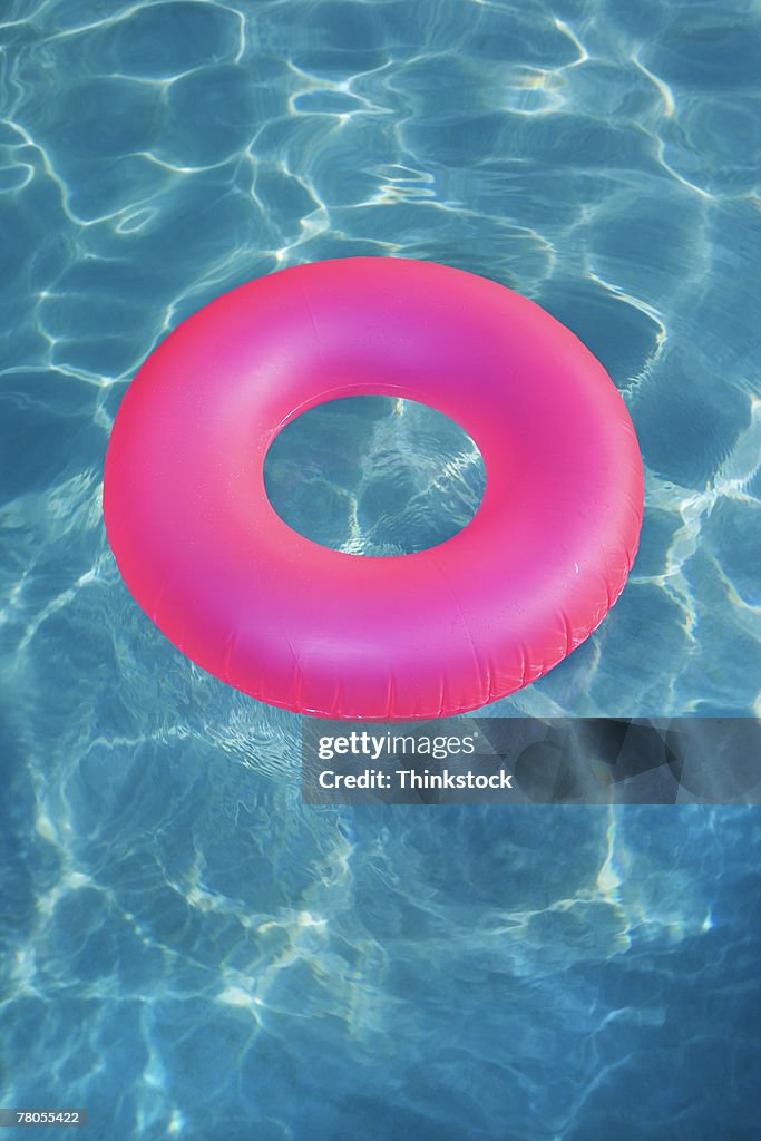 Inner Tube Floating In Pool High-Res Stock Photo - Getty Images