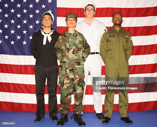 us military soldiers and american flag - women airforce stock pictures, royalty-free photos & images