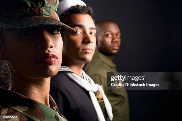soldiers - man in military uniform stock pictures, royalty-free photos & images