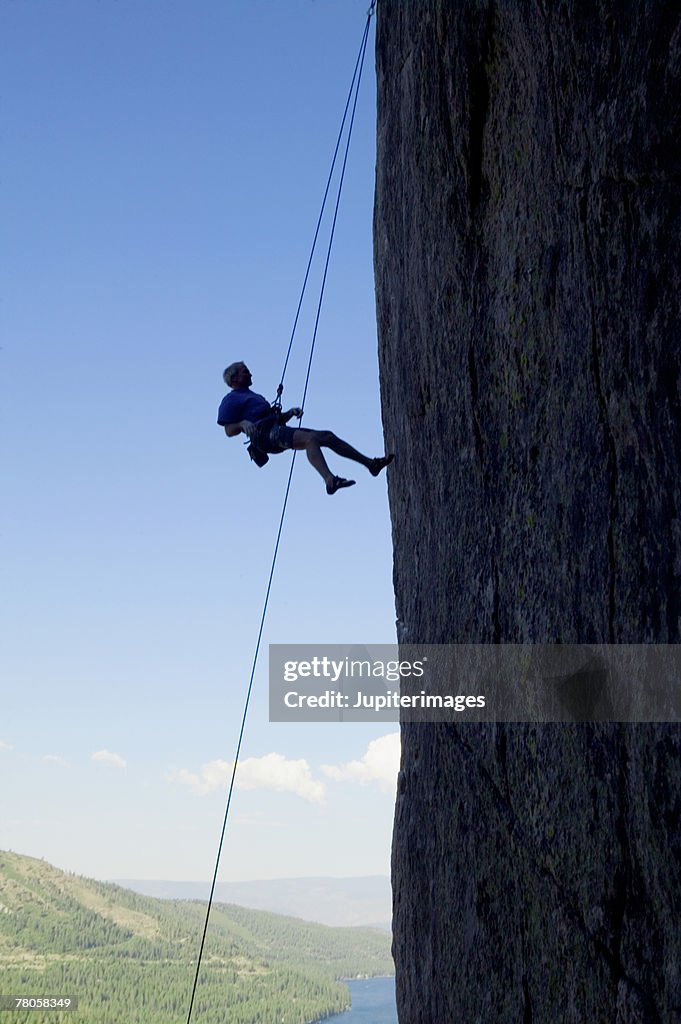 Man rock climbing