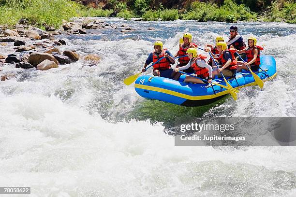 whitewater rafters - boat river stockfoto's en -beelden