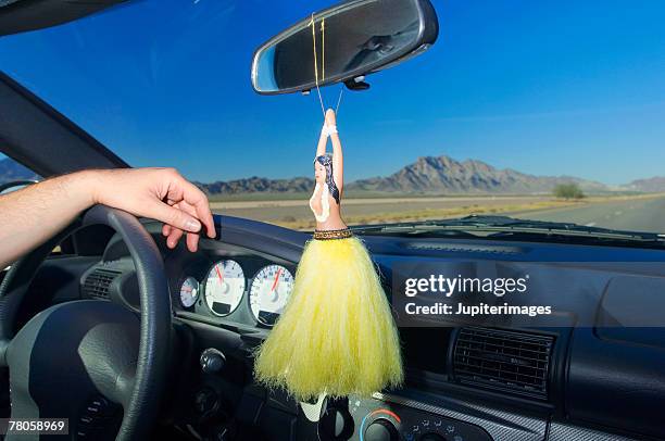 hula doll in car - hula stock pictures, royalty-free photos & images