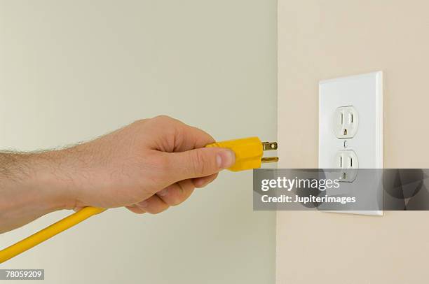 Plugging In Photos and Premium High Res Pictures - Getty Images