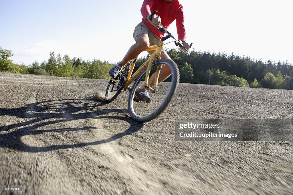 Persohn Riding Bike Person Riding Bike High-Res Stock Photo - Getty Images