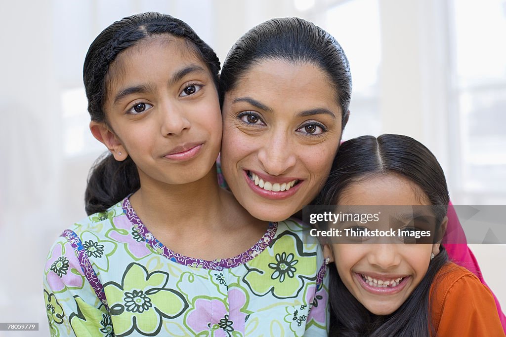 Portrait of mother and daughters