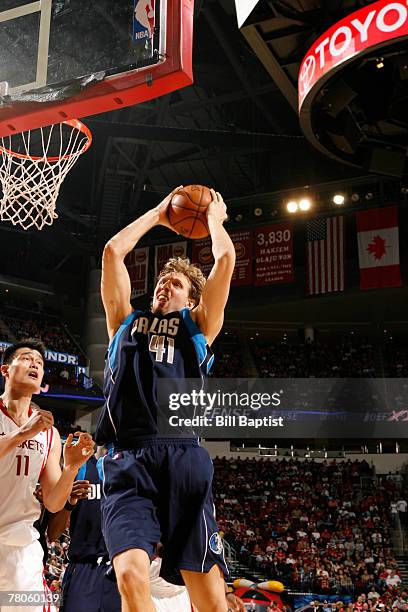 Dirk Nowitzki of the Dallas Mavericks shoots the ball against the Houston Rockets on November 21, 2007 at the Toyota Center in Houston, Texas. NOTE...