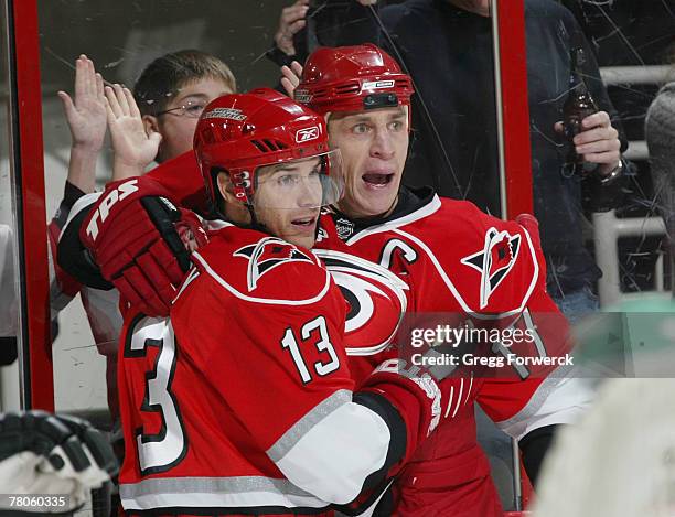Rod Brind Amour of the Carolina Hurricanes celebrates his first period goal with teammate Ray Whitney ina game against the Philadelphia Flyers on...