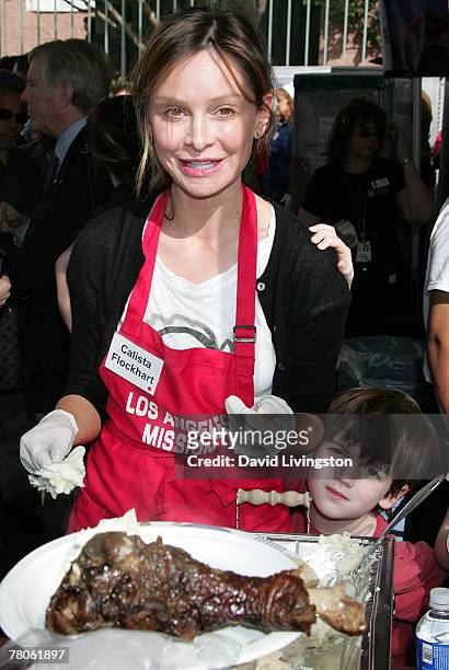 Actress Calista Flockhart and her son Liam Flockhart attend the Los Angeles Mission and Anne Douglas Center's Thanksgiving Meal for the Homeless on...