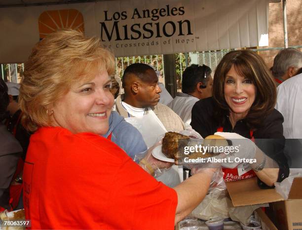 Actress Kate Linder participates in serving Thanksgiving dinner to the Skid Row homeless hosted by Kirk and Anne Douglas at the Los Angeles Mission...