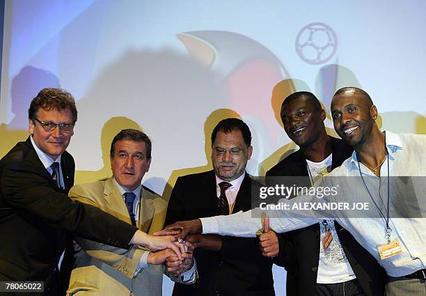 Secretary General Jerome Valcke, coach of the Bafana Bafana, the South African national football team Brazil's Carlos Parreira, South Africa's Local...