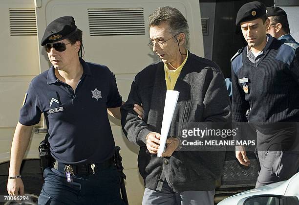 French Thierry Beille arrive at the courthouse in Lagos, southern Portugal, 22 November 2007. Beille and hiis half sister Corinne Caspar are on trial...