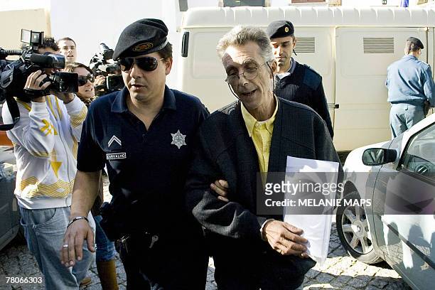 French Thierry Beille arrive at the courthouse in Lagos, southern Portugal, 22 November 2007. Beille and hiis half sister Corinne Caspar are on trial...
