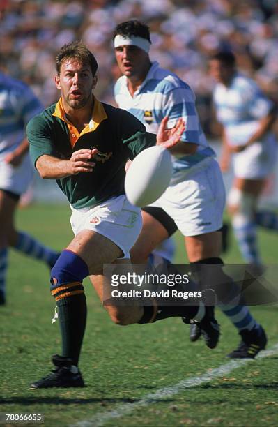 South African rugby player Johan Roux in action for his country during the Frist Test against Argentina, 8th October 1994.