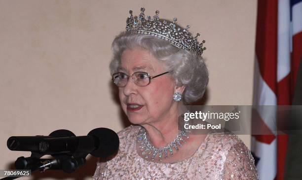 Queen Elizabeth II talks at a State Banquet at State House on November 22, 2007 in Entebbe, Uganda. The Queen will open the Commonwealth Heads of...
