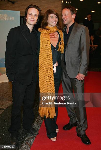 Actor August Diehl, actress Jessica Schwarz and actor Wotan Wilke Moehring attend the 'Nichts als Gespenster' premiere at the Cinema International...