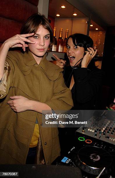 Presenter Alexa Chung and singer Lisa Moorish DJ at the Kova & T launch party at Harvey Nichols November 22, 2007 in London, England.