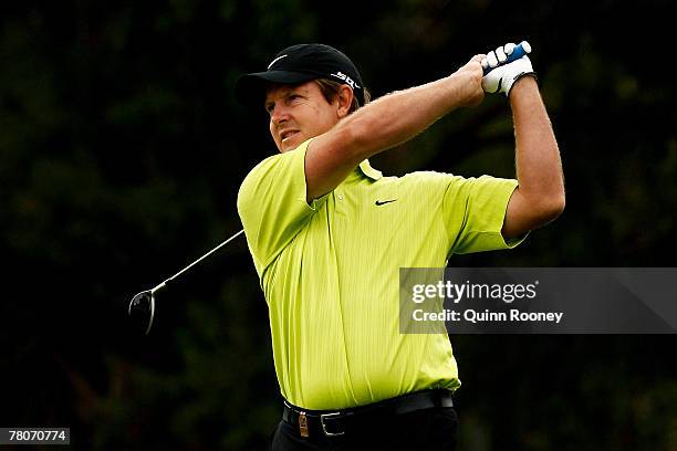 Scott Laycock of Australia hits his second shot on the 14th hole during round two of the MasterCard Masters held at Huntingdale Golf Course November...