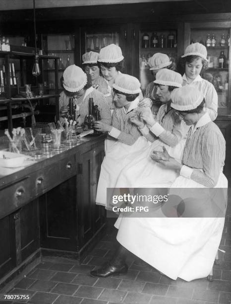 Medical students at work in a laboratory, circa 1925.