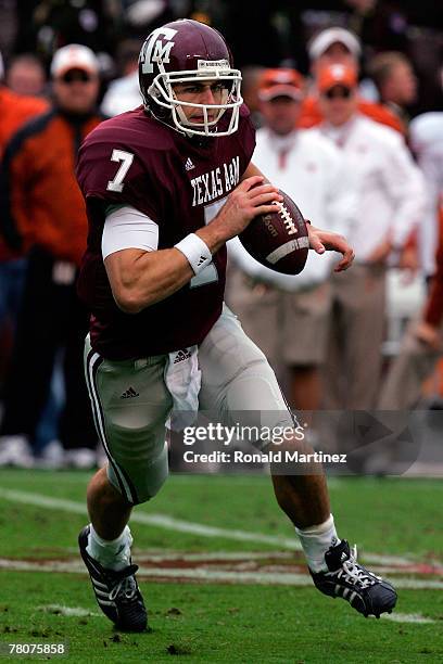 Quarterback Stephen McGee of the Texas A&M Aggies drops back to pass against the Texas Longhorns in the first quarter at Kyle Field on November 23,...