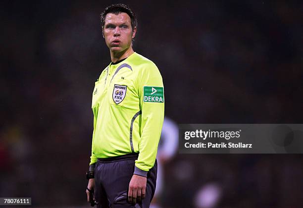 Referee Michael Weiner looks on during the Bundesliga match between Karlsruher SC and Hertha BSC Berlin at the Wildpark stadium on November 23, 2007...