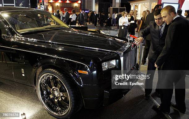 Visitors attend the Millionaire Fair 2007 at Crocus Expo November 22, 2007 in Moscow, Russia. The Millionaire Fair, the world's largest exhibit of...