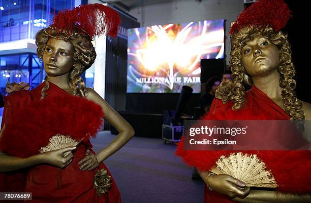 Models pose at the Millionaire Fair 2007 at Crocus Expo November 22, 2007 in Moscow, Russia. The Millionaire Fair, the world's largest exhibit of...