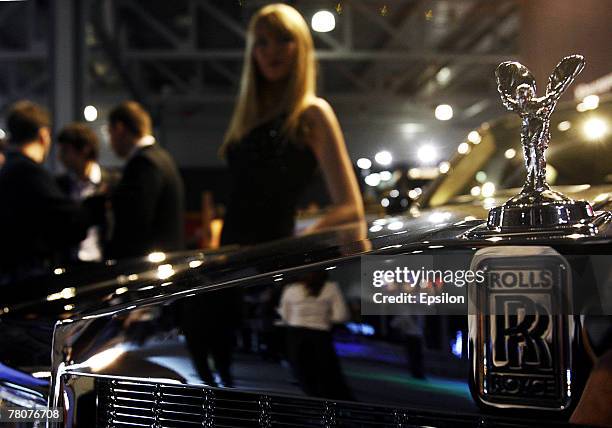 Model poses at the Millionaire Fair 2007 at Crocus Expo November 22, 2007 in Moscow, Russia. The Millionaire Fair, the world's largest exhibit of...