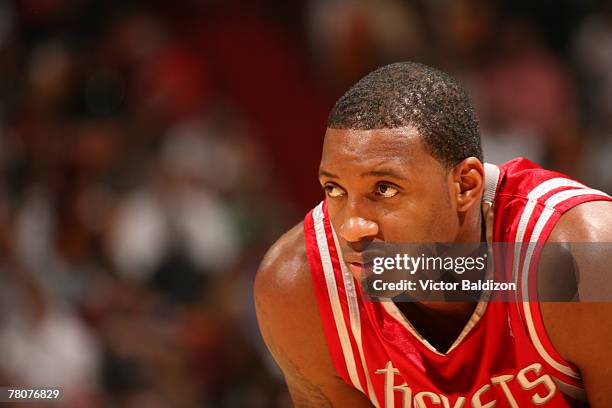 Tracy McGrady of the Houston Rockets takes a breather during the game against the Miami Heat at the American Airlines Arena November 23, 2007 in...