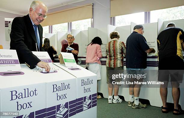 Prime Minister John Howard casts his vote at Ermington Primary School on November 24, 2007 in Sydney, Australia. More than 13.5 millions Australians...