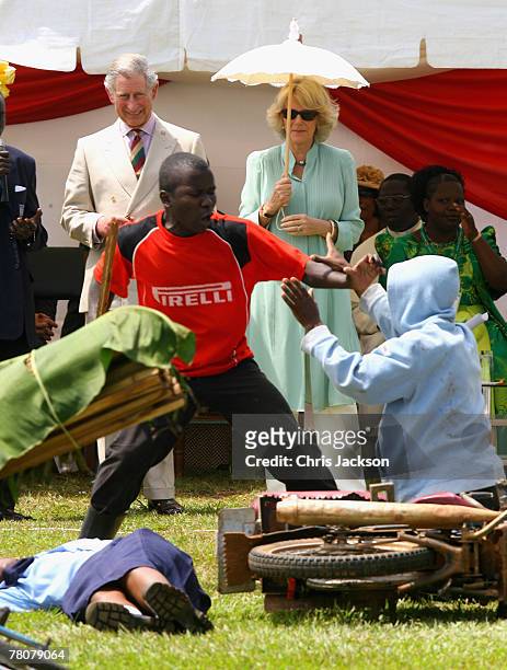 Camilla, Duchess of Cornwall and Prince Charles, Prince of Wales watch a first Aid demonstration during a visit to St Joseph's School on November 24,...