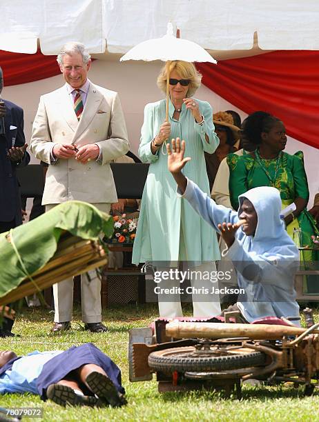 Camilla, Duchess of Cornwall and Prince Charles, Prince of Wales watch a first Aid demonstration during a visit to St Joseph's School on November 24,...