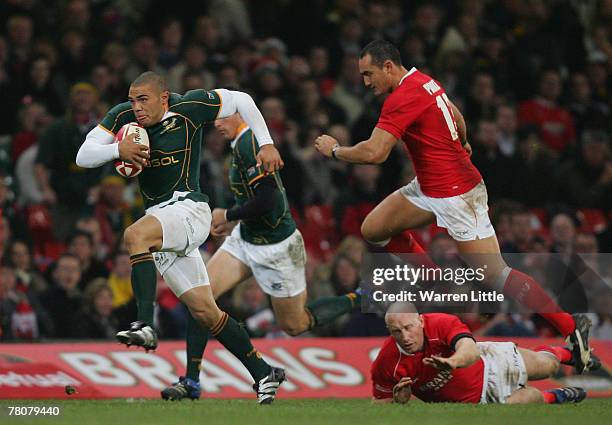 Bryan Habana of South Africa splits open the Welsh defence during the rugby union international friendly match between Wales and South Africa at the...