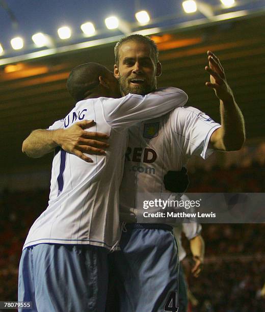 Olof Mellberg of Aston Villa celebrates his goal with Ashley Young during the Barclays Premier League match between Middlesbrough and Aston Villa at...