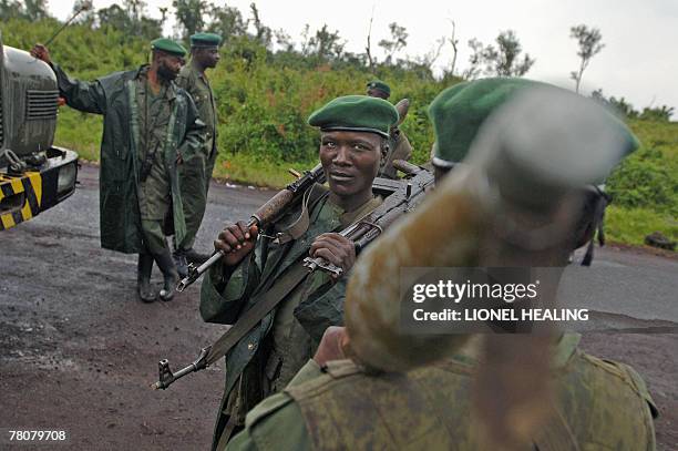 Government soldiers stand on a road, 24 November 2007, in Rugari, near Goma. Tension is rising in the North Kivu province of eastern Democratic...