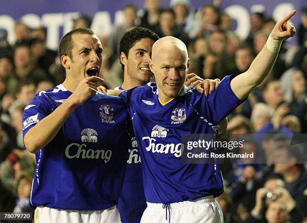 Andrew Johnson of Everton celebrates scoring his team's sixth goal with team mates Leon Osmanand Mikel Arteta during the Barclays Premier League...