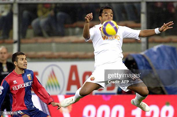 Roman Mancini Amantino controls the ball from Danilo of Genoa during their Italian serie A football match at Genova Marassi stadium, 24 November...